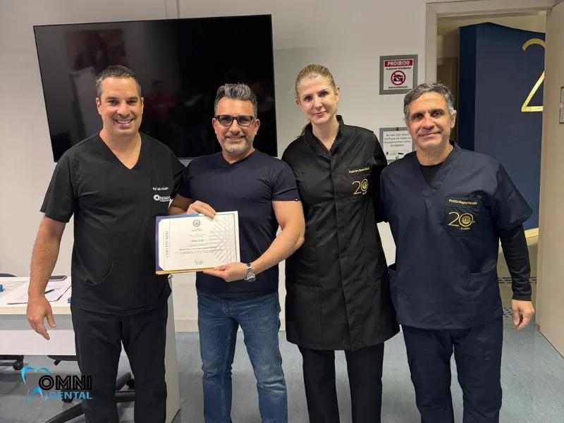 Dr. Poles receiving ILAPEO certificate