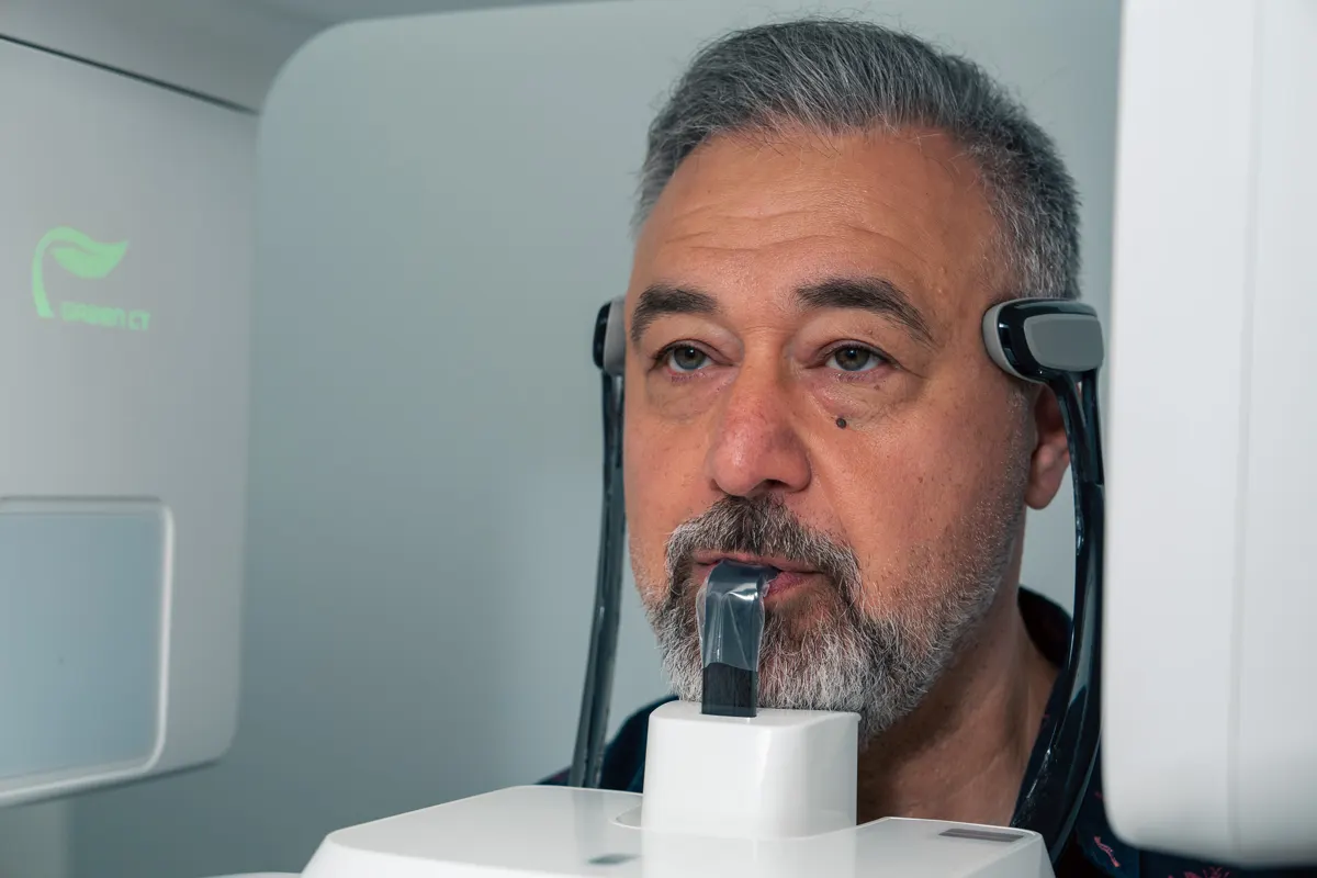 Dr. Poles showing scan to patient at Omni Dental in Arlington Heights, IL