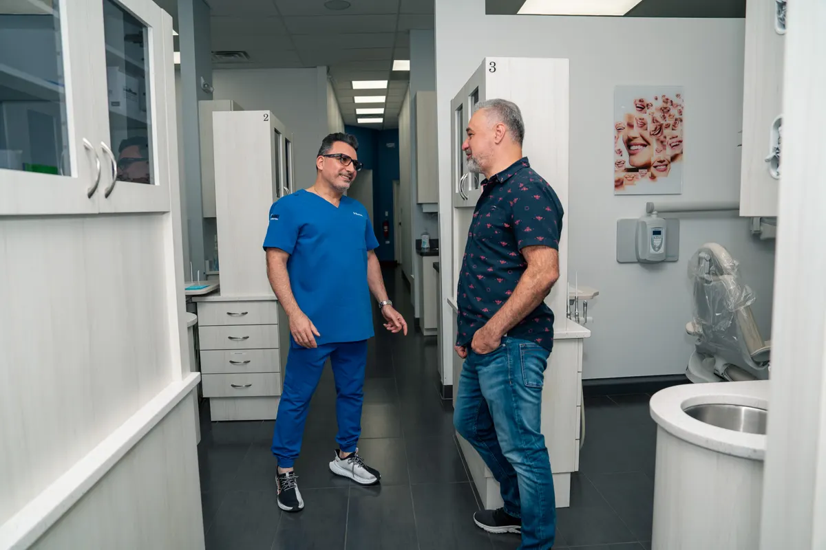 Dr. Poles talking with a patient in Arlington Heights, IL