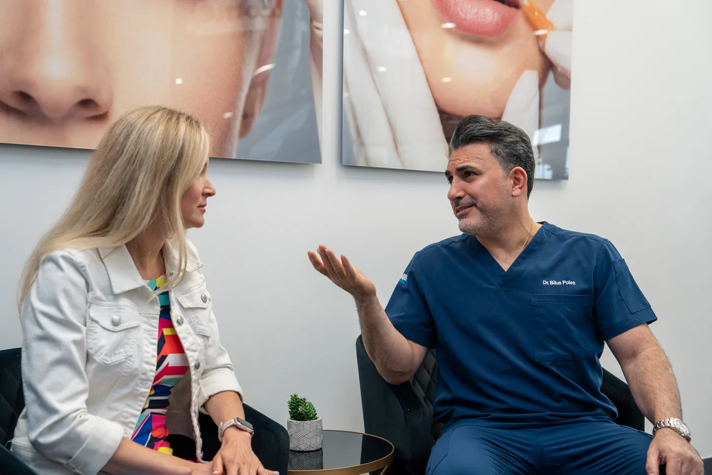Dr. Bilus Poles talking with a patient about teeth whitening at Omni Dental, Arlington Heights, IL